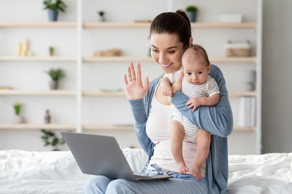 young mom meeting virtually with a sleep consultant
