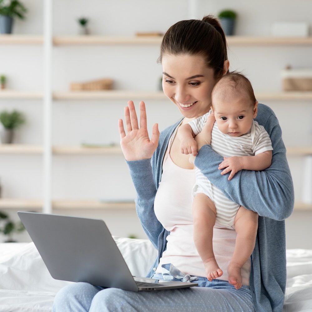 young mom meeting virtually with a sleep consultant