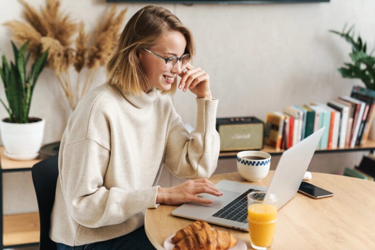 woman setting up an email funnel on a laptop